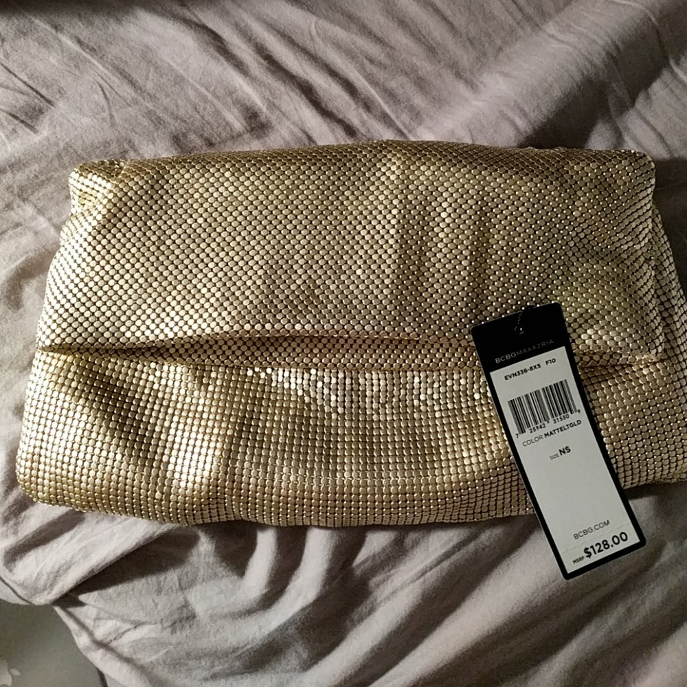 Never used, beautiful metallic bcbgmaxazria clutch